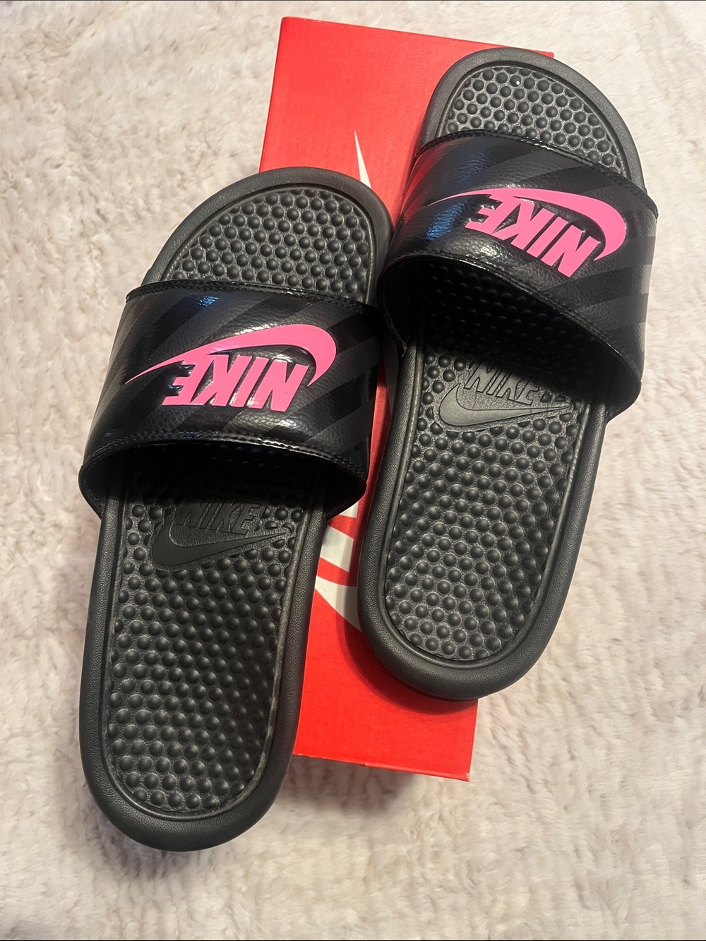 Nike Black Slides with Pink Swoosh Logo